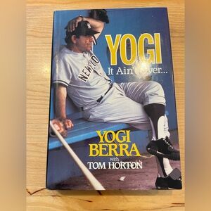Yogi It Ain’t Over book signed by Yogi Berra